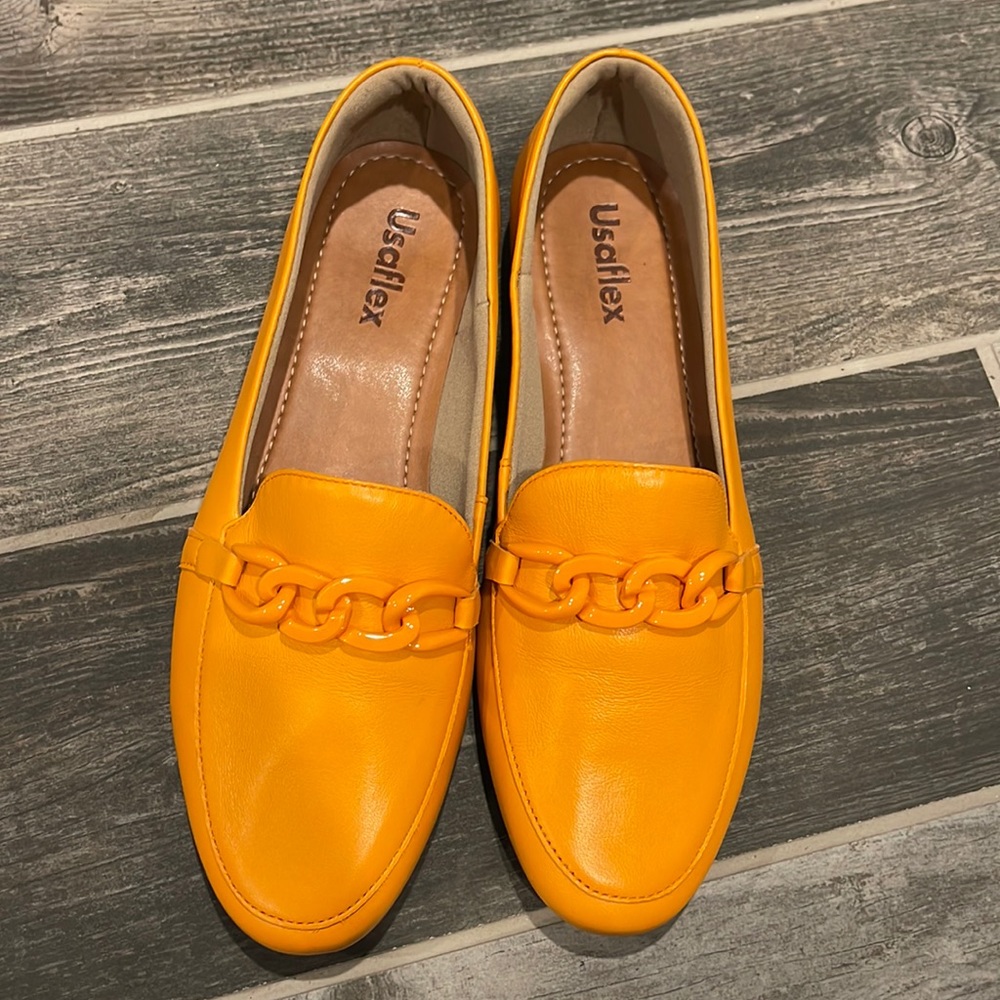 Yellow mocassim from Brazil. New without box.yellow papaya color.